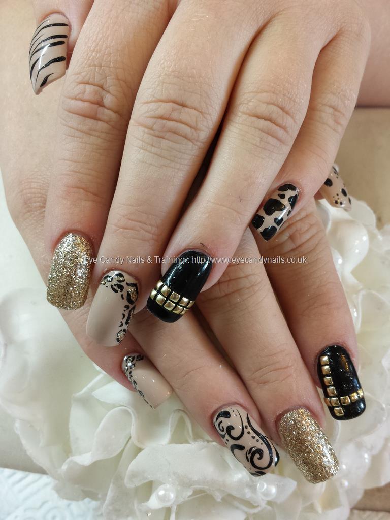 Nude black and gold freehand nail art over acrylic nails NailArt  