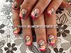 Multi coloured freehand nail art over acrylic nails