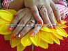 Acrylic nails with orange gel polish ,one stroke nail art