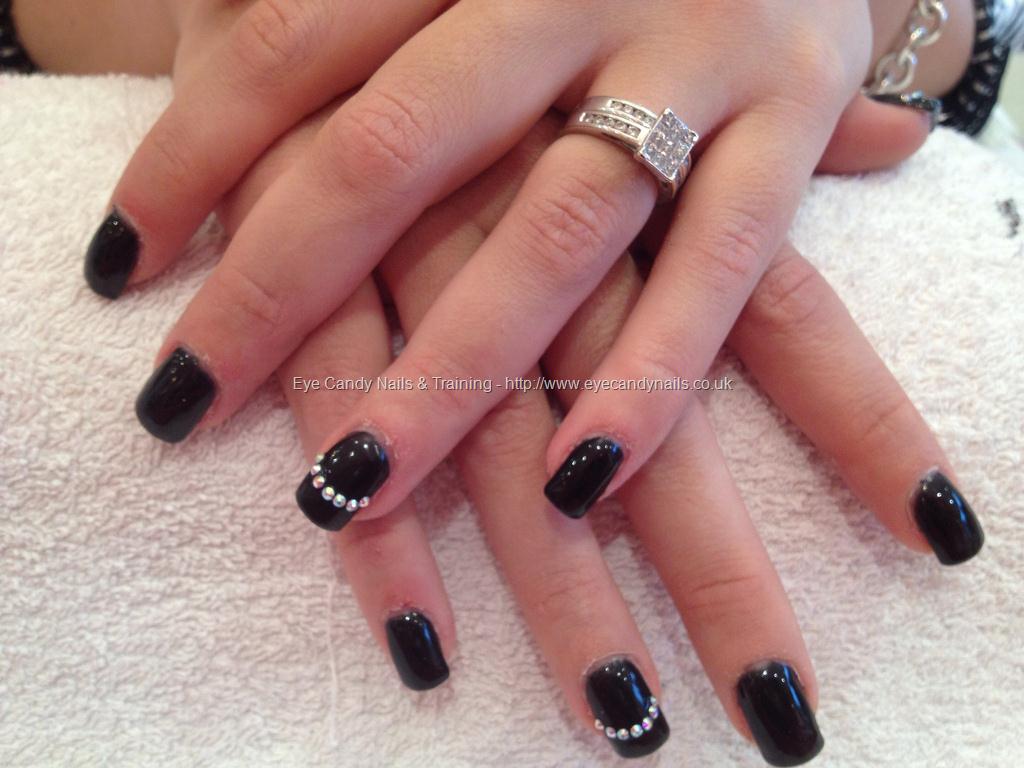 Acrylic nails with black polish and gems #NailArt #Nails