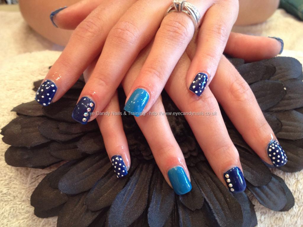Acrylic nails with blue polish and nail art #NailArt #Nails