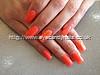 Acrylic nails with orange gel polish