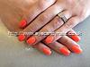 Acrylic nails with orange gel polish