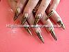 Full set of stilettos with black and gold nail art