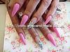 Stiletto nails with pink gel polish