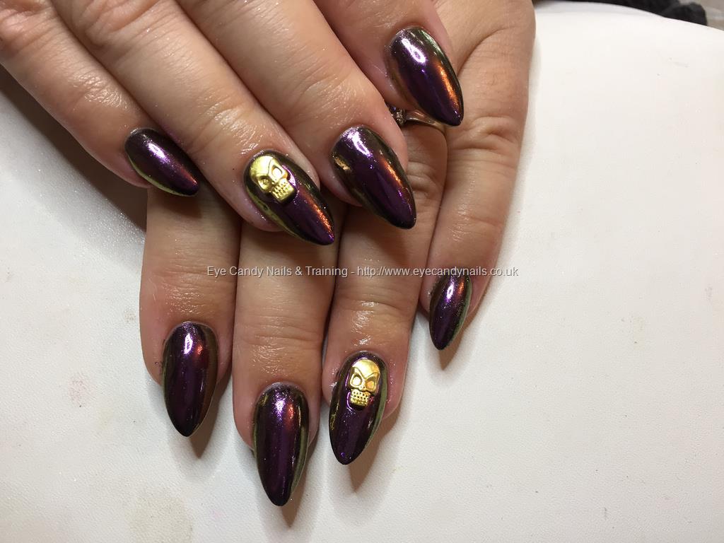 Eye Candy Nails & Training - Almond acrylics with purple/gold multi chrome  and gold skulls by Amy Mitchell on 19 October 2016 at 11:47