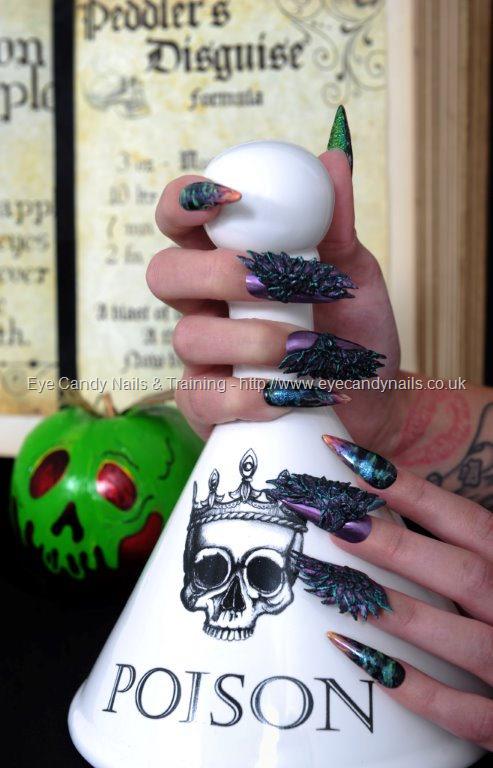 1st place Brillbird Nail Art Competition. Theme - Film And Television. 6th April 2015. Snow White and the poison apple. Black almond shaped gel nails with freehand flame tips and smoke effect nail art.