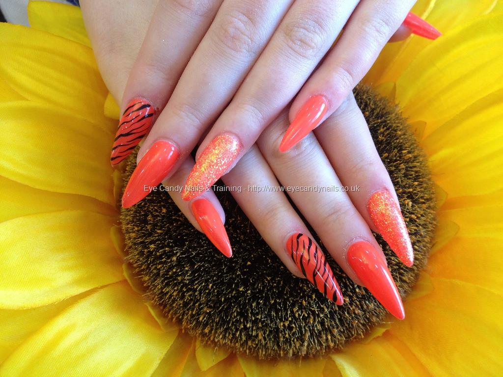 Eye Candy Nails & Training - Stiletto nails with orange gel polish and ...